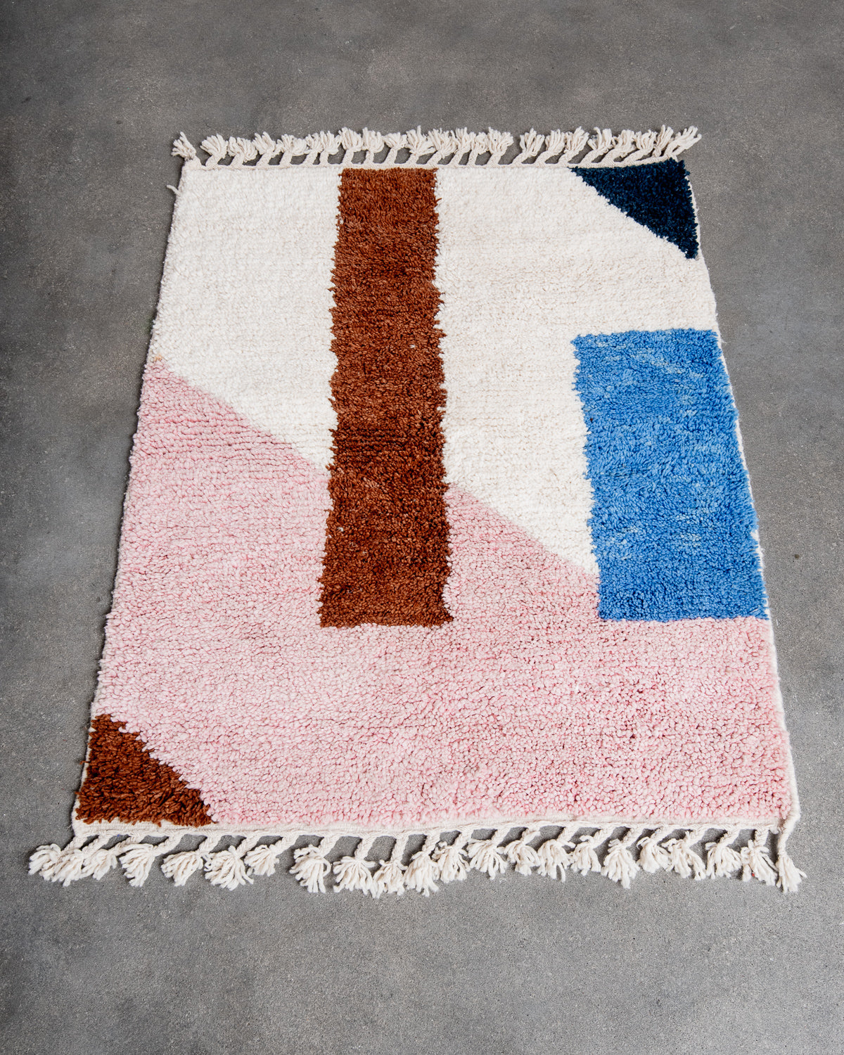 Modern, designer, handcrafted Berber rug from Morocco. Beniourain carpet with beautiful colours and patterns and fluffy wool texture.